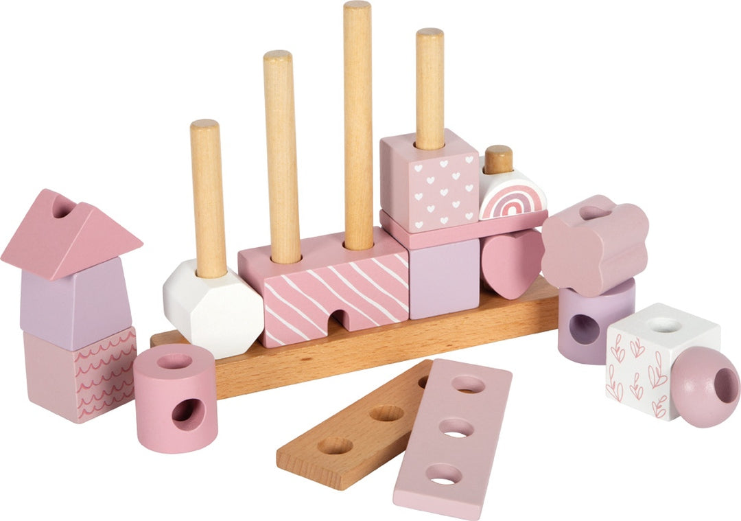 Personalized pink stacking house for a newborn | small foot by Schmatzepuffer